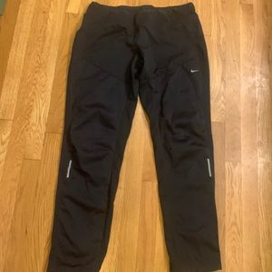 Nike Running women’s pants with zips size large